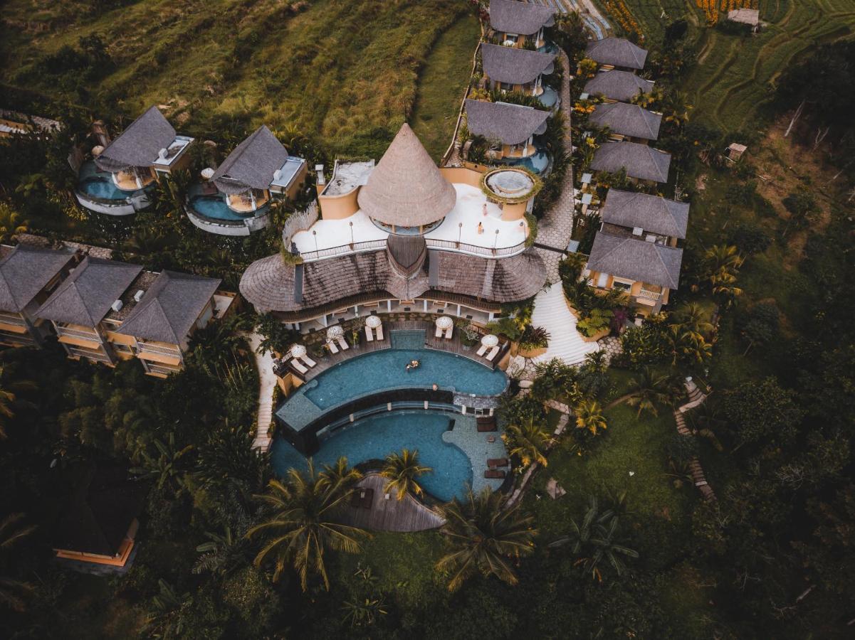 Отель Wapa Di Ume Sidemen Сидемен Экстерьер фото Aerial view of the resort