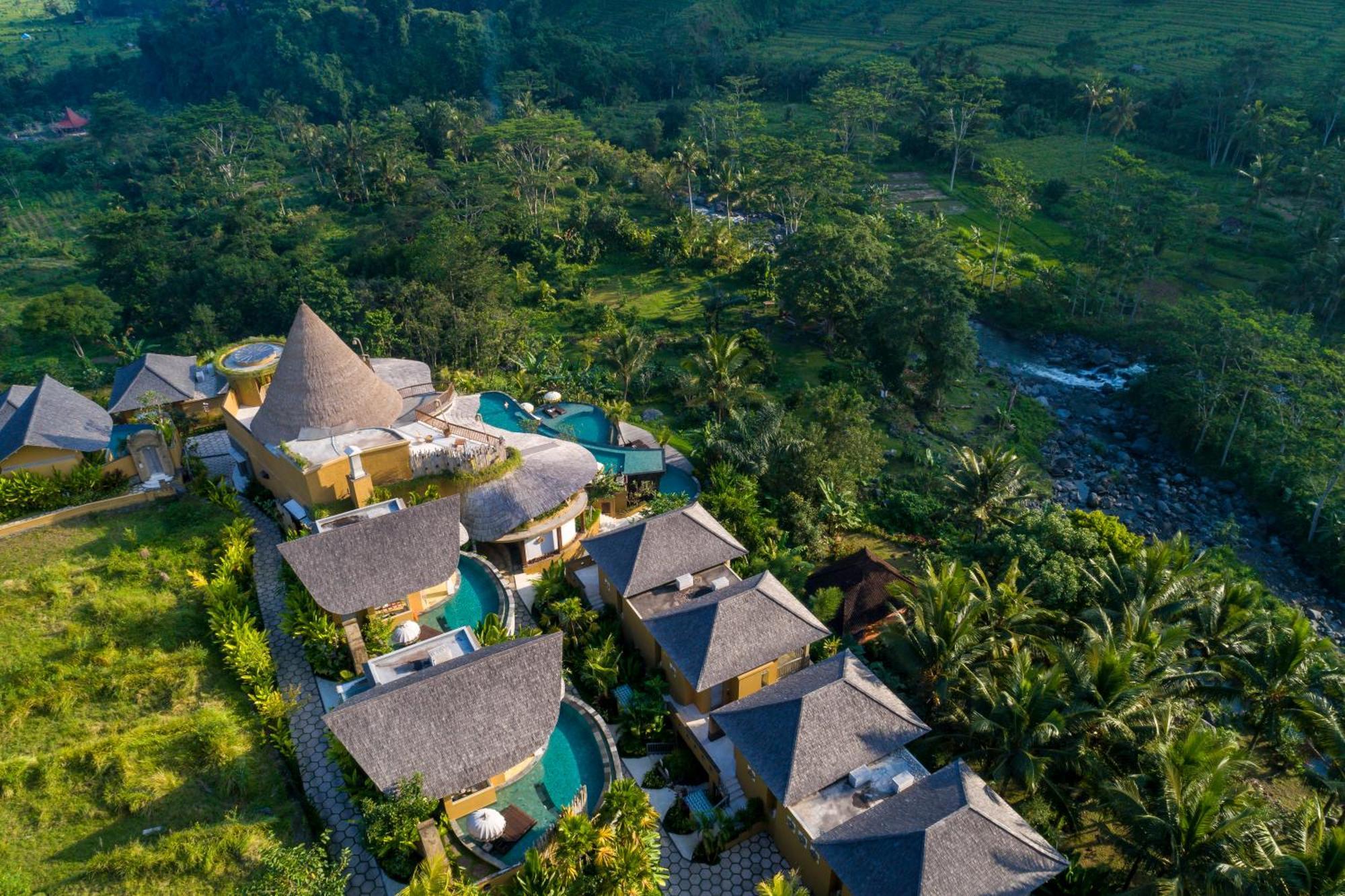 Отель Wapa Di Ume Sidemen Сидемен Экстерьер фото Aerial view of the resort