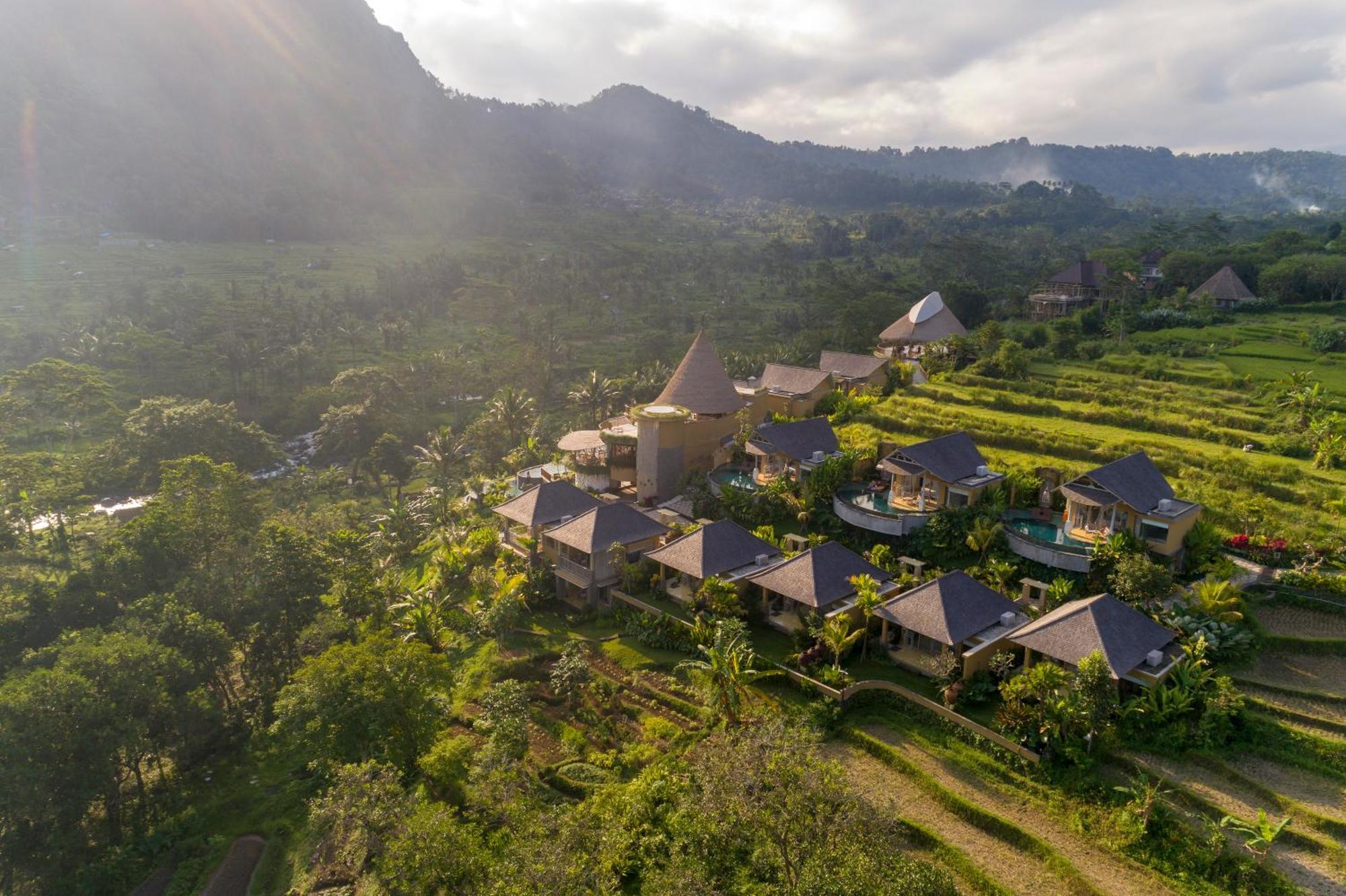 Отель Wapa Di Ume Sidemen Сидемен Экстерьер фото Aerial view of the resort